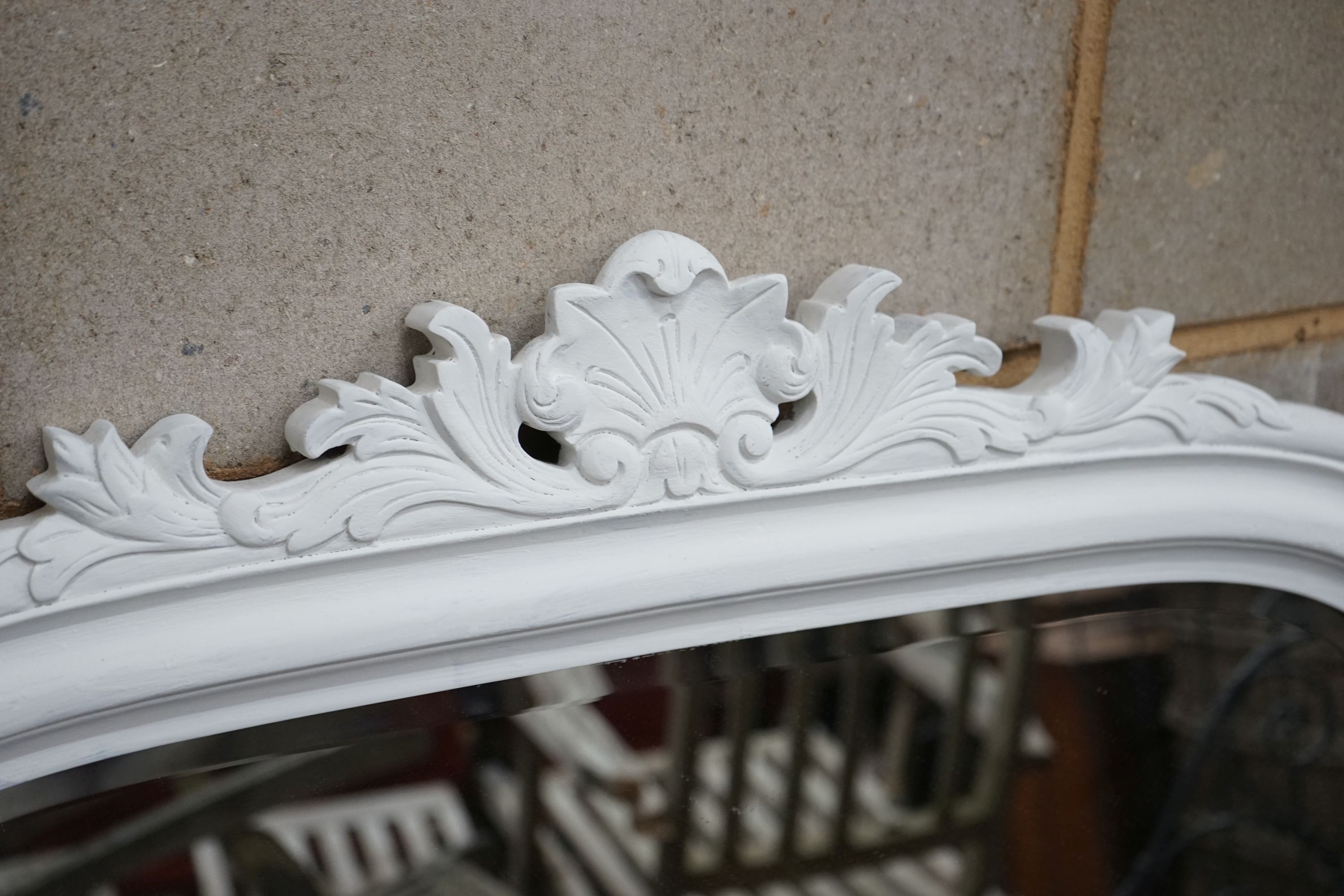 A Victorian style overmantel mirror, later white painted, width 110cm, height 126cm